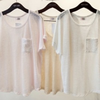Remera flame con bolsillos pallietes