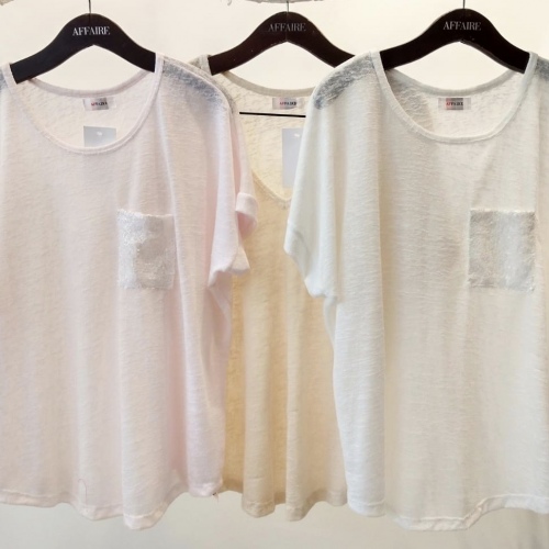 Remera flame con bolsillos pallietes